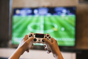 person playing ps5